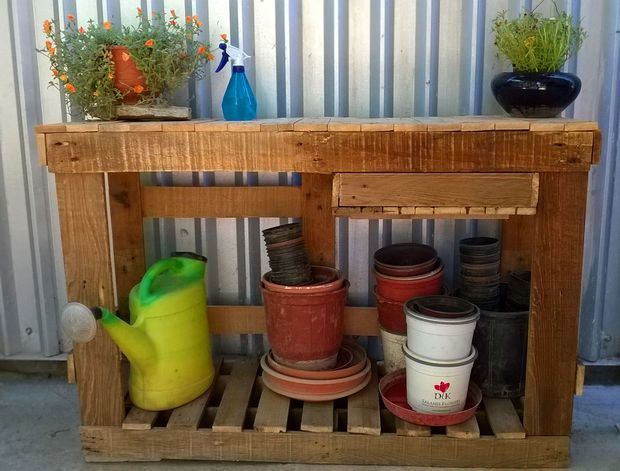 Potting bench with whole length storage