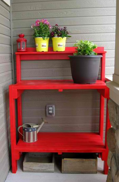 Red coloured potting bench